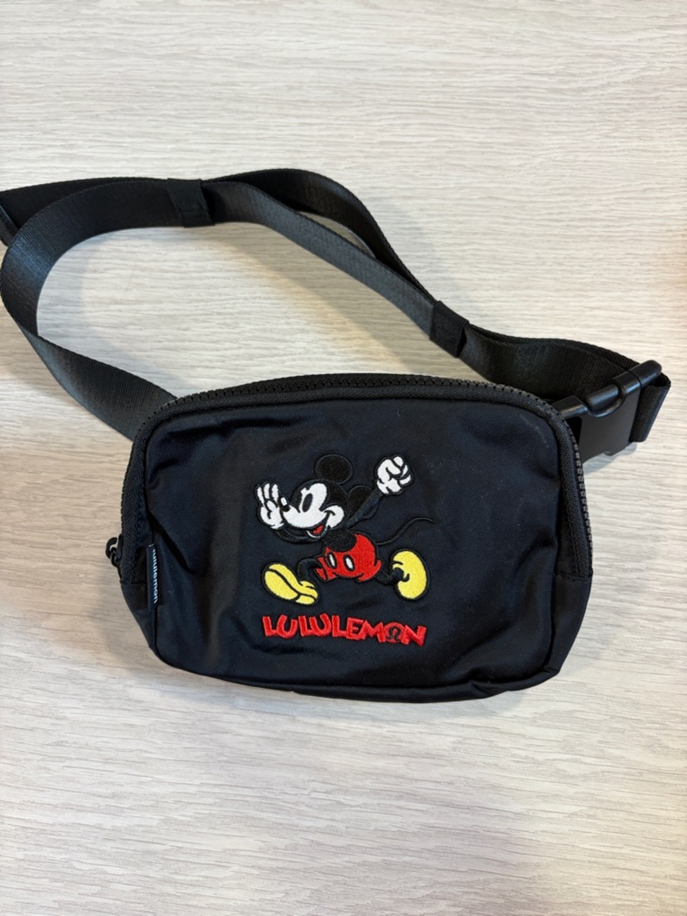 lululemon black mini crossbody with Mickey embroidery